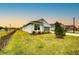 Landscaped lawn with a view of the home's exterior at 6907 162Nd E Pl, Parrish, FL 34219