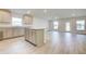 Modern kitchen with gray cabinets and granite countertops at 7030 162Nd E Pl, Parrish, FL 34219