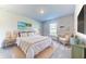 Comfortable bedroom with a king-size bed and coastal decor at 6830 162Nd Place E. E Pl, Parrish, FL 34219