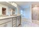 Modern bathroom with granite countertops and a soaking tub at 7014 162Nd Place E. E Pl, Parrish, FL 34219