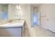 Double vanity bathroom with granite countertop and linen closet at 6814 162Nd E Pl, Parrish, FL 34219