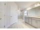 Modern bathroom with double vanity and walk-in shower at 6814 162Nd E Pl, Parrish, FL 34219