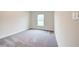 Bright bedroom featuring carpeted floor and window at 6814 162Nd E Pl, Parrish, FL 34219