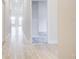 Clean and spacious hallway with light tile flooring at 6814 162Nd E Pl, Parrish, FL 34219