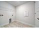 Laundry room with vinyl flooring and shelving at 6814 162Nd E Pl, Parrish, FL 34219