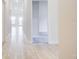 Bright hallway with tile flooring leading to other rooms at 7018 162Nd E Pl, Parrish, FL 34219