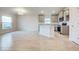 Modern kitchen featuring gray cabinets and granite countertops at 7018 162Nd E Pl, Parrish, FL 34219
