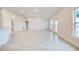 Spacious living area with tile flooring and access to patio at 7018 162Nd E Pl, Parrish, FL 34219