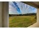Large backyard with grassy lawn and fenced in at 16123 69Th E Ln, Parrish, FL 34219