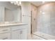 Modern bathroom with granite countertop and glass shower at 16123 69Th E Ln, Parrish, FL 34219