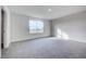 Spacious bedroom with large window and plush carpeting at 16123 69Th E Ln, Parrish, FL 34219