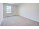 Bright bedroom featuring neutral walls and plush carpeting at 16123 69Th E Ln, Parrish, FL 34219