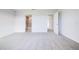 Spacious bedroom with carpeting, and ensuite bathroom access at 16123 69Th E Ln, Parrish, FL 34219