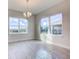 Bright dining room with chandelier and large windows at 16123 69Th E Ln, Parrish, FL 34219