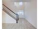Bright entryway with stairs and wood-like flooring at 16123 69Th E Ln, Parrish, FL 34219