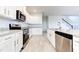 Modern kitchen with stainless steel appliances at 6931 162Nd E Pl, Parrish, FL 34219