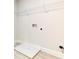 Laundry room with shelving, drain, and space for washer/dryer at 6931 162Nd E Pl, Parrish, FL 34219