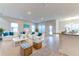 Open living space with comfortable seating and tile floors at 6931 162Nd E Pl, Parrish, FL 34219