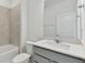 Bathroom features a vanity with quartz countertop at 1279 Kazaz Ct, Zephyrhills, FL 33540
