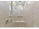 Clean bathroom with a walk-in shower and neutral tile at 1279 Kazaz Ct, Zephyrhills, FL 33540