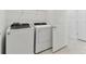 Laundry room with Whirlpool washer and dryer at 1279 Kazaz Ct, Zephyrhills, FL 33540