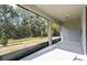 Screened porch with view of backyard at 1279 Kazaz Ct, Zephyrhills, FL 33540