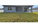 Home exterior showcasing a backyard and patio at 1285 Kazaz Ct, Zephyrhills, FL 33540