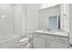 Clean bathroom with white subway tile and quartz vanity at 1285 Kazaz Ct, Zephyrhills, FL 33540