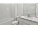 Clean bathroom with white subway tile and quartz vanity at 1285 Kazaz Ct, Zephyrhills, FL 33540