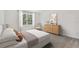 Bright bedroom with large window and ample space for furniture at 1285 Kazaz Ct, Zephyrhills, FL 33540