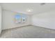Spacious bedroom with carpet and neutral walls at 1244 Kazaz Ct, Zephyrhills, FL 33540