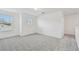 Bright bedroom with carpet and neutral walls at 1244 Kazaz Ct, Zephyrhills, FL 33540