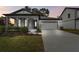 Two-story house with attached garage at 37886 Clinch Cir, Zephyrhills, FL 33540