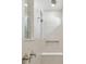 Clean shower with tile surround and built-in bench at 37886 Clinch Cir, Zephyrhills, FL 33540