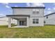 Two story home with covered patio and fenced backyard at 1209 Kistna Dr, Zephyrhills, FL 33540