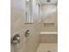 Spa-like shower with built-in bench and modern fixtures at 1209 Kistna Dr, Zephyrhills, FL 33540