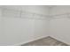 Spacious walk-in closet with wire shelving at 1209 Kistna Dr, Zephyrhills, FL 33540
