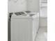 Bright laundry room with side-by-side washer and dryer at 1209 Kistna Dr, Zephyrhills, FL 33540