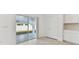 Kitchen with sliding door leading to backyard patio at 1185 Kistna Dr, Zephyrhills, FL 33540
