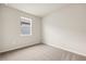 Bright bedroom with carpet flooring and a window offering natural light at 3722 Maxwell Park Dr, Sun City Center, FL 33573