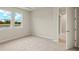 Spacious bedroom with carpet and access to bathroom at 3782 Maxwell Park Dr, Sun City Center, FL 33573