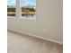 Bright bedroom with carpet and water view at 3782 Maxwell Park Dr, Sun City Center, FL 33573