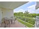 Enjoy serene views from this balcony, overlooking the water and greenery at 3226 Mangrove Point Dr, Ruskin, FL 33570