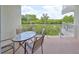 Enjoy outdoor dining on this balcony with water views at 3226 Mangrove Point Dr, Ruskin, FL 33570