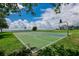 Outdoor basketball court with scenic waterfront views at 3226 Mangrove Point Dr, Ruskin, FL 33570