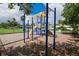 playground with climbing structures and slides at 3226 Mangrove Point Dr, Ruskin, FL 33570