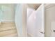 Light-colored wood staircase with storage at 11612 Mansfield Point Dr, Riverview, FL 33569