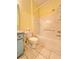 Bathroom with shower/tub combo and teal vanity at 761 Tremont Greens Ln # 61, Sun City Center, FL 33573