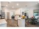 Spacious kitchen with an island, white cabinets, and stainless steel appliances at 811 Woodcarver Ln, Brandon, FL 33510