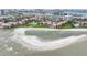 Aerial view showing the community's waterfront location and beach at 851 Bayway Blvd # 104, Clearwater Beach, FL 33767